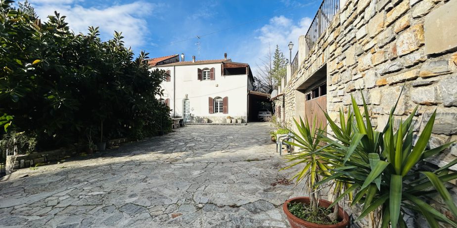 Semi-detached villa with large courtyard and land