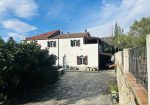 Semi-detached villa with large courtyard and land