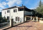 Semi-detached villa with large courtyard and land