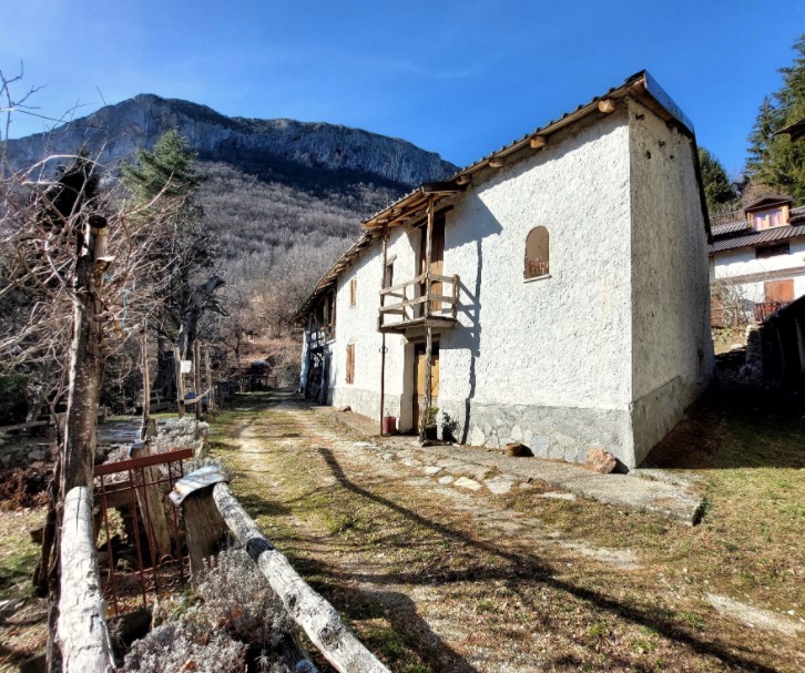 Typical mountain farmhouse with large land