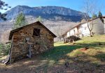 Typical mountain farmhouse with large land