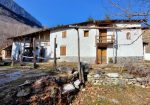 Typical mountain farmhouse with large land