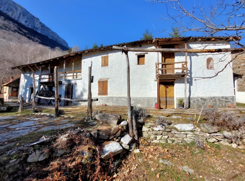 Typical mountain farmhouse with large land