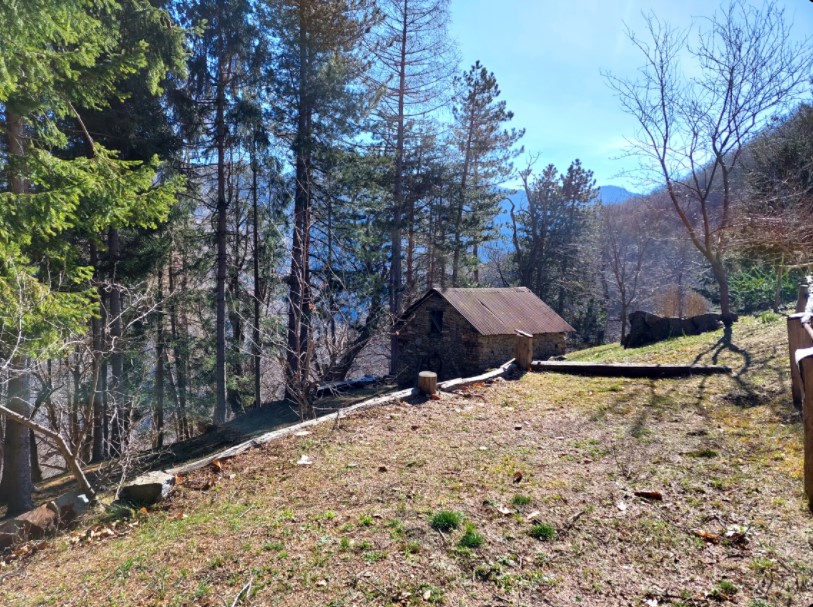 Typical mountain farmhouse with large land