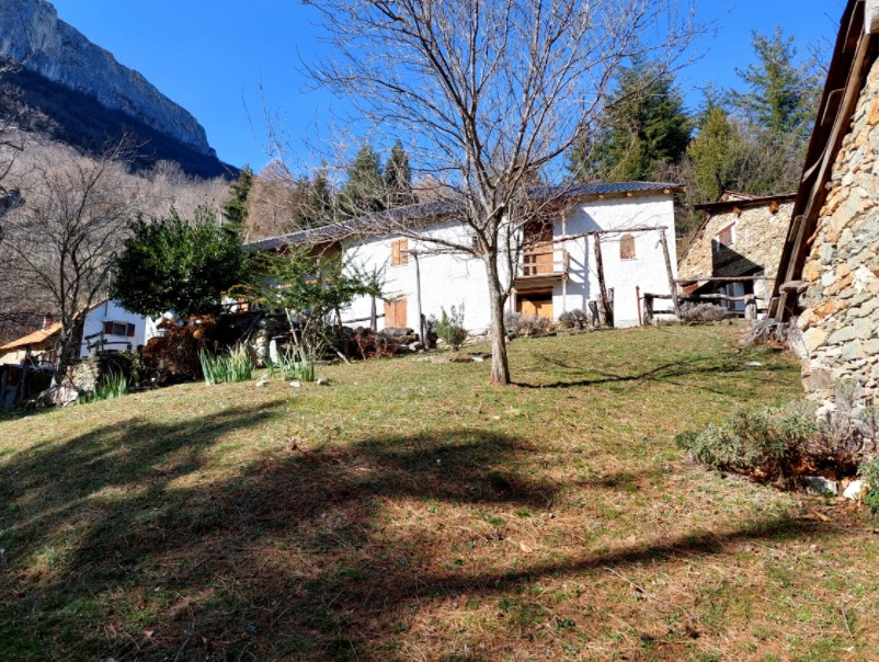 Typical mountain farmhouse with large land