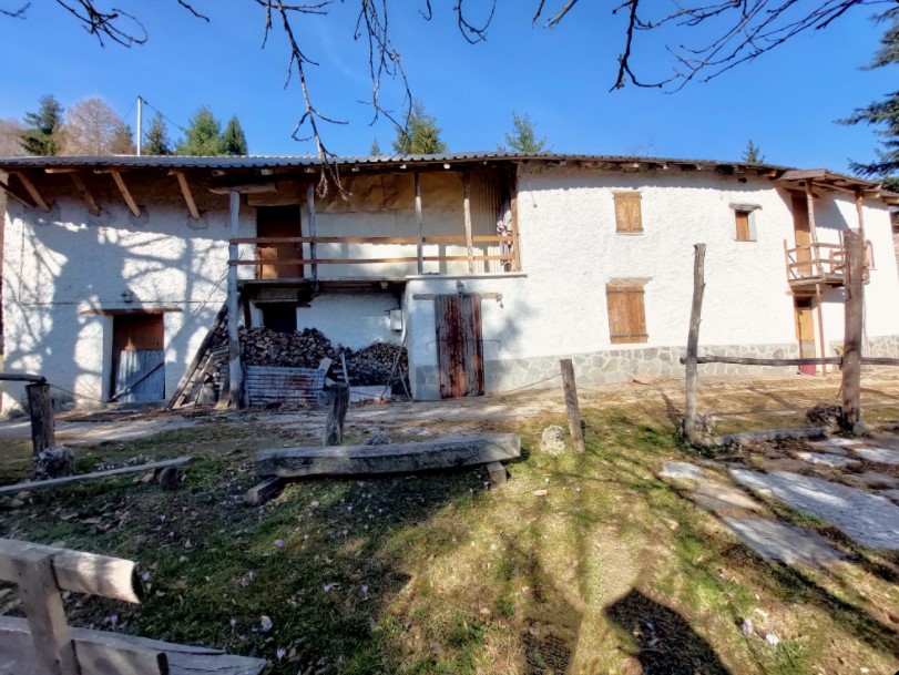 Typical mountain farmhouse with large land