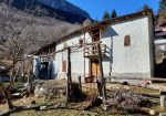 Typical mountain farmhouse with large land