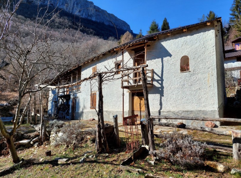 Typical mountain farmhouse with large land