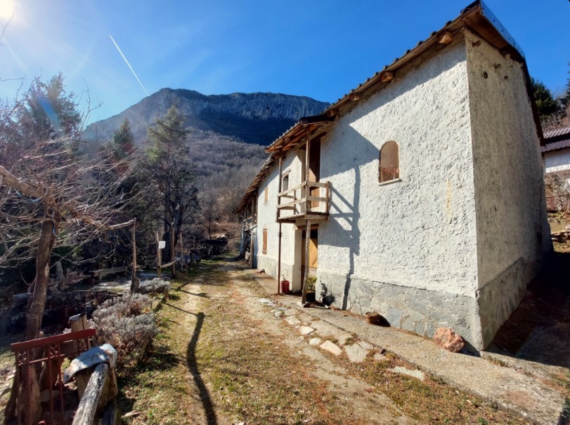 Typical mountain farmhouse with large land