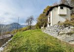 Detached house with land and stone farmhouse.