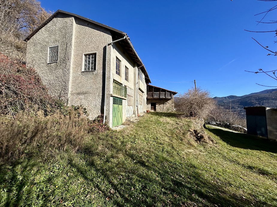 Detached farmhouse with land