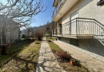 Large semi-detached villa with surrounding land.