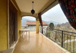 Large semi-detached villa with surrounding land.