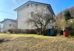 Large semi-detached villa with surrounding land.