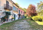 Large house to renovate with large private land in the village