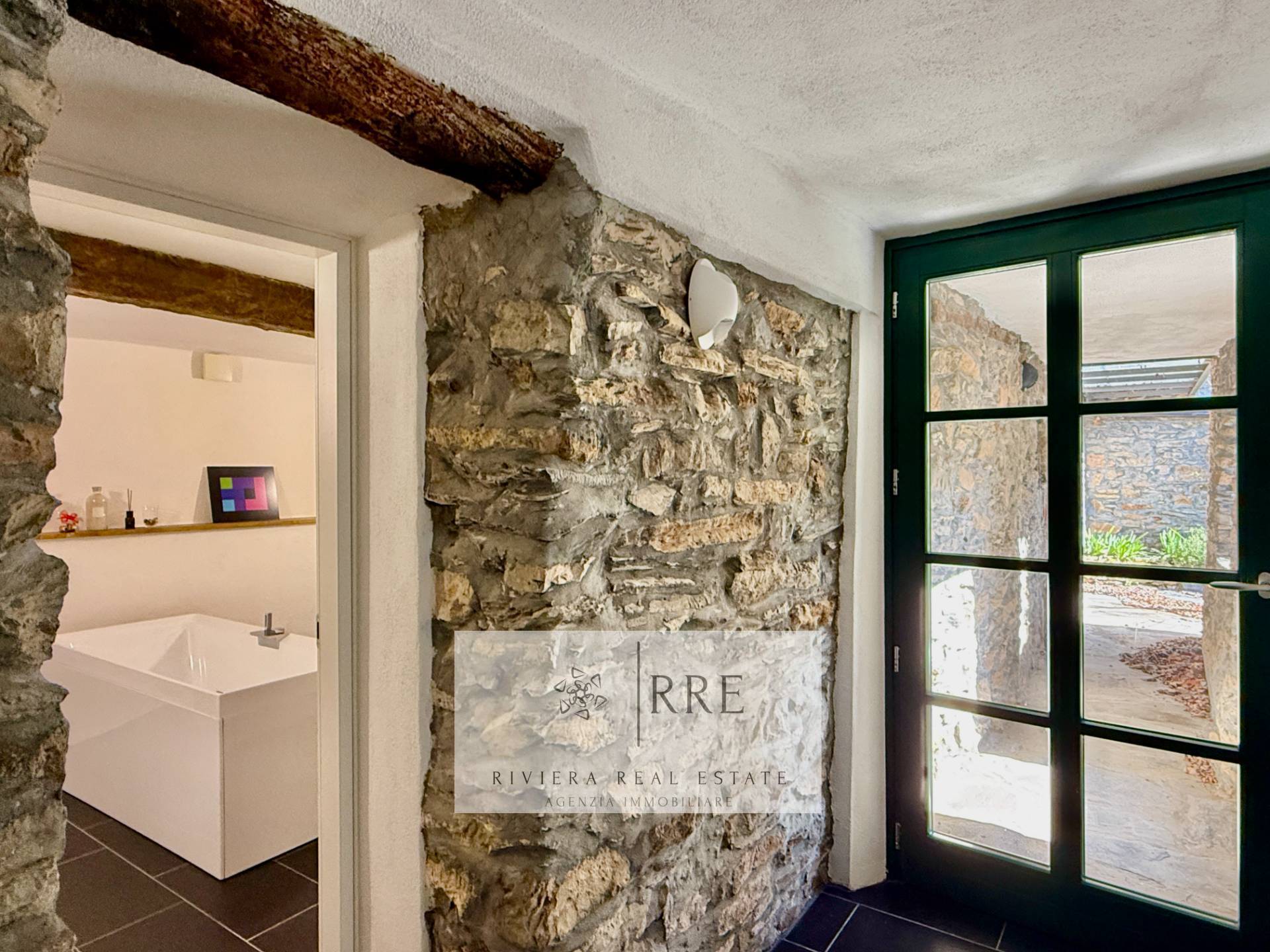 Semi-detached house with terrace overlooking the valley in Aquila d’Arroscia