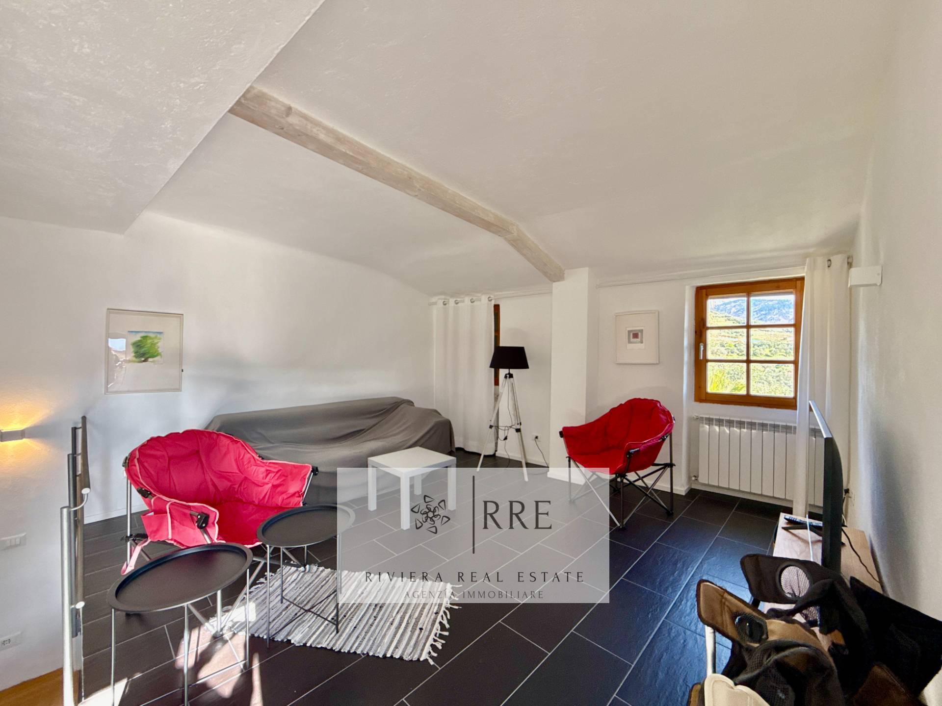 Semi-detached house with terrace overlooking the valley in Aquila d’Arroscia