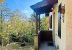 Detached villa with surrounding land.