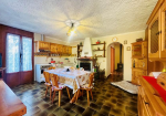Detached villa with surrounding land.