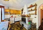 Detached villa with surrounding land.