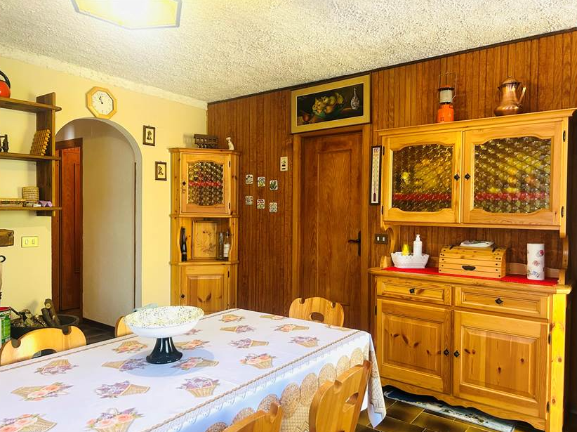 Detached villa with surrounding land.