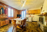 Detached villa with surrounding land.