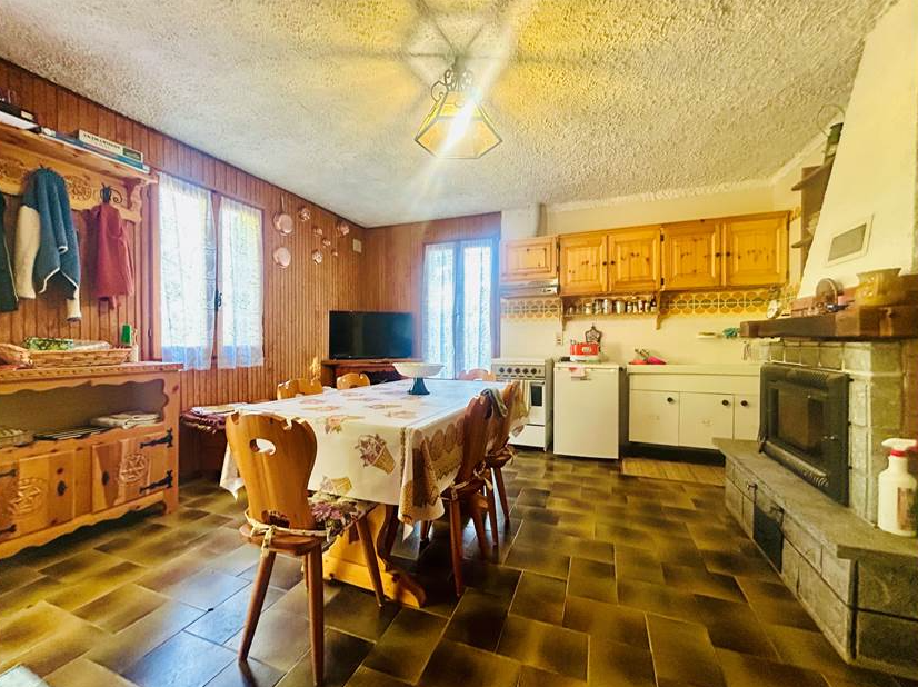 Detached villa with surrounding land.