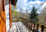 Detached villa with surrounding land.
