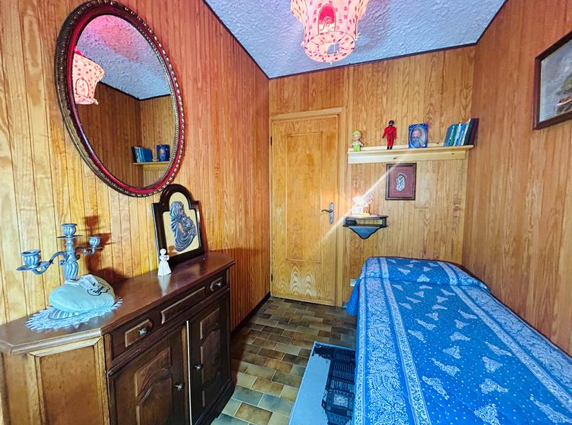 Detached villa with surrounding land.