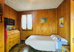 Detached villa with surrounding land.