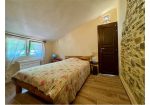 Two-story independent apartment with driveway courtyard, garden.