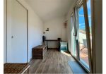 Two-story independent apartment with driveway courtyard, garden.