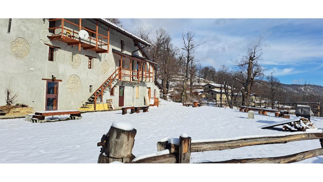 Three rustic stone house sourraunding by 7500 sqm of private land