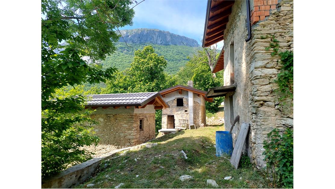 Three rustic stone house sourraunding by 7500 sqm of private land
