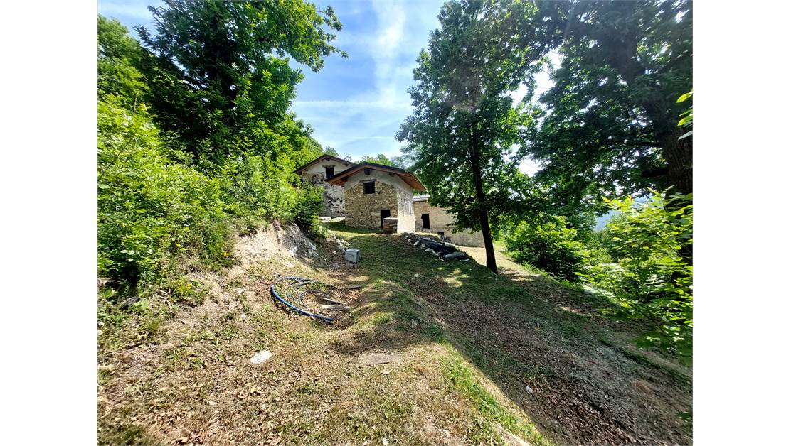 Three rustic stone house sourraunding by 7500 sqm of private land