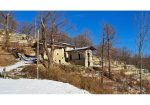 Three rustic stone house sourraunding by 7500 sqm of private land