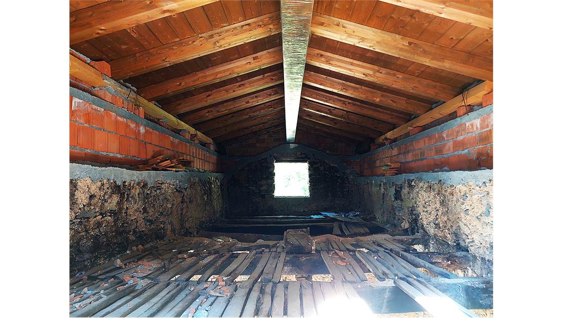 Three rustic stone house sourraunding by 7500 sqm of private land