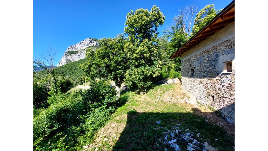 Three rustic stone house sourraunding by 7500 sqm of private land