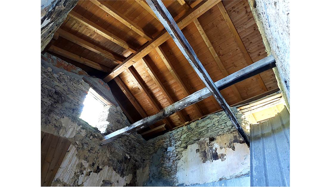 Three rustic stone house sourraunding by 7500 sqm of private land