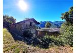 Three rustic stone house sourraunding by 7500 sqm of private land