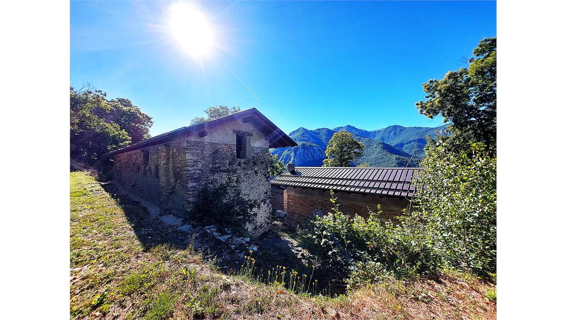 Three rustic stone house sourraunding by 7500 sqm of private land