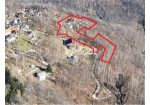 Three rustic stone house sourraunding by 7500 sqm of private land