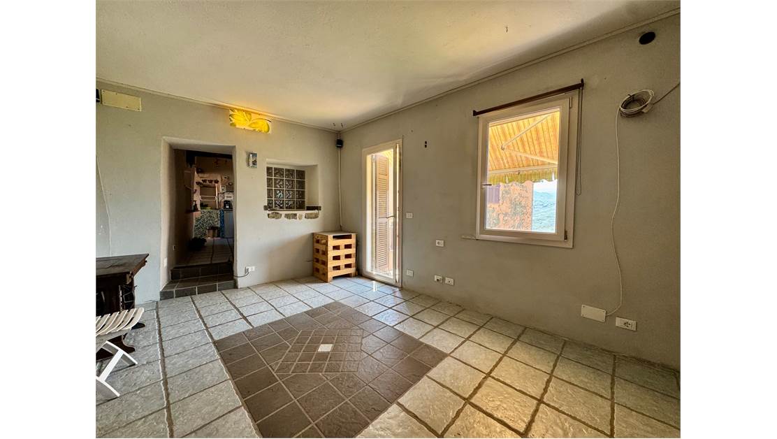 Two-level village house with storage room and land