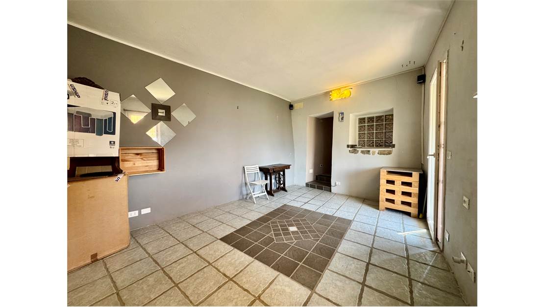 Two-level village house with storage room and land
