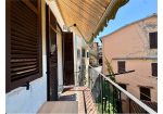 Two-level village house with storage room and land