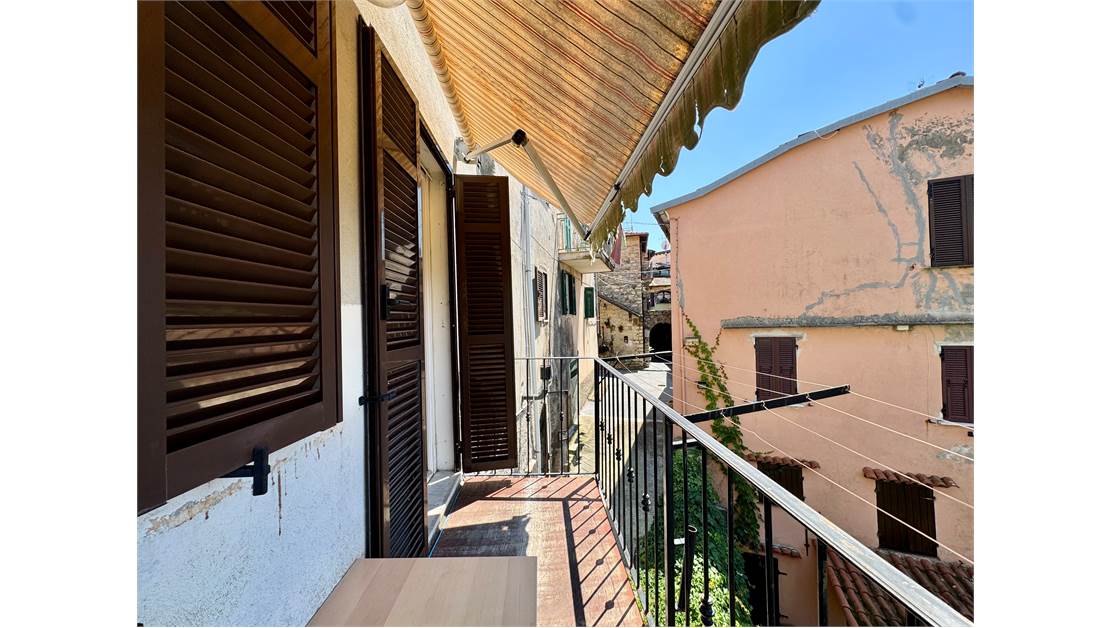 Two-level village house with storage room and land