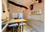 Two-level village house with storage room and land