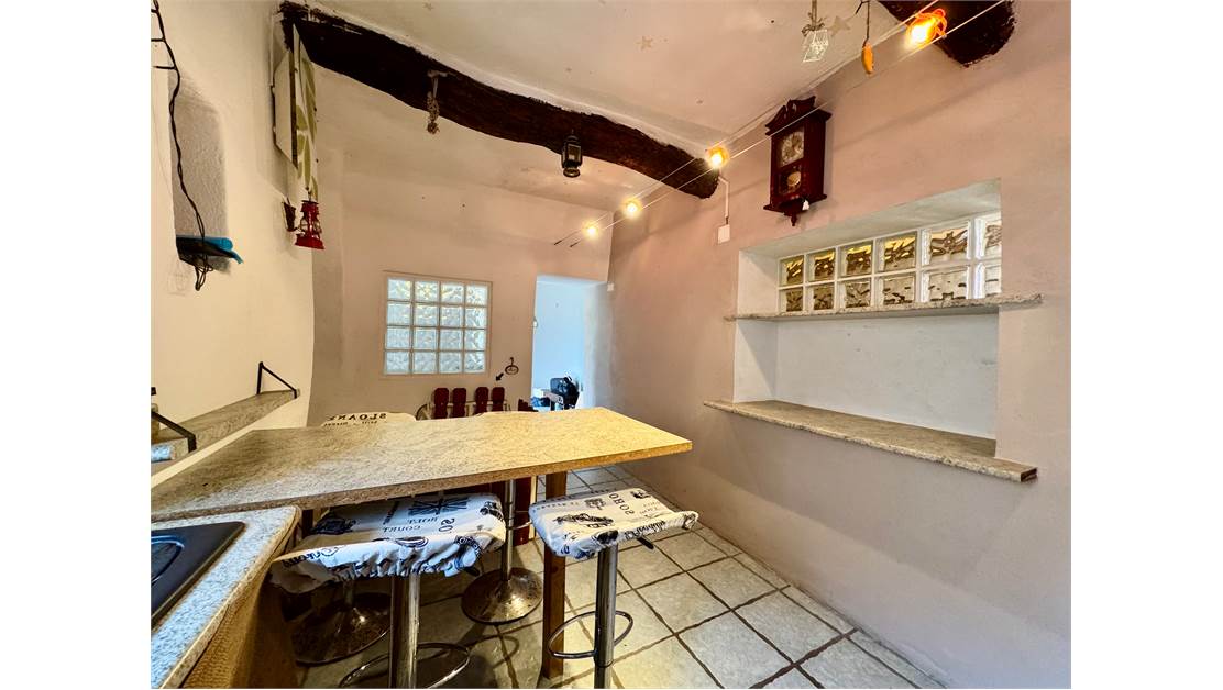Two-level village house with storage room and land