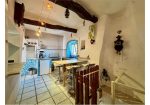 Two-level village house with storage room and land