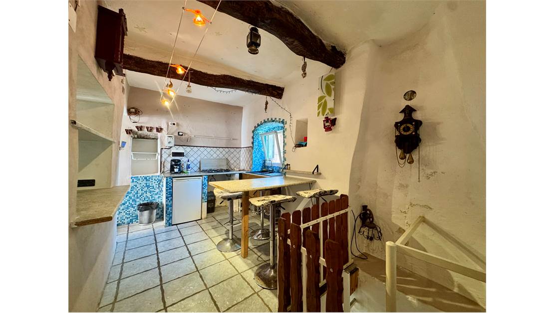 Two-level village house with storage room and land